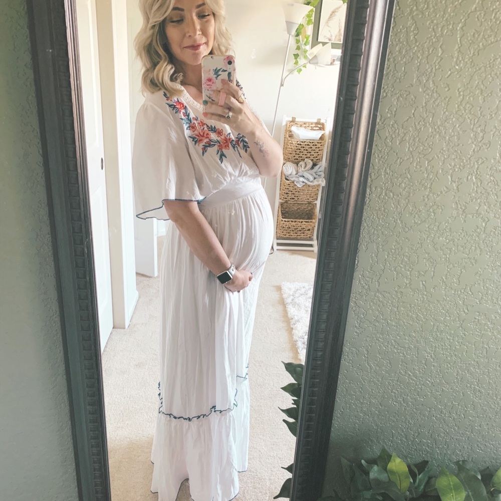 White maxi dress with floral embroidery
